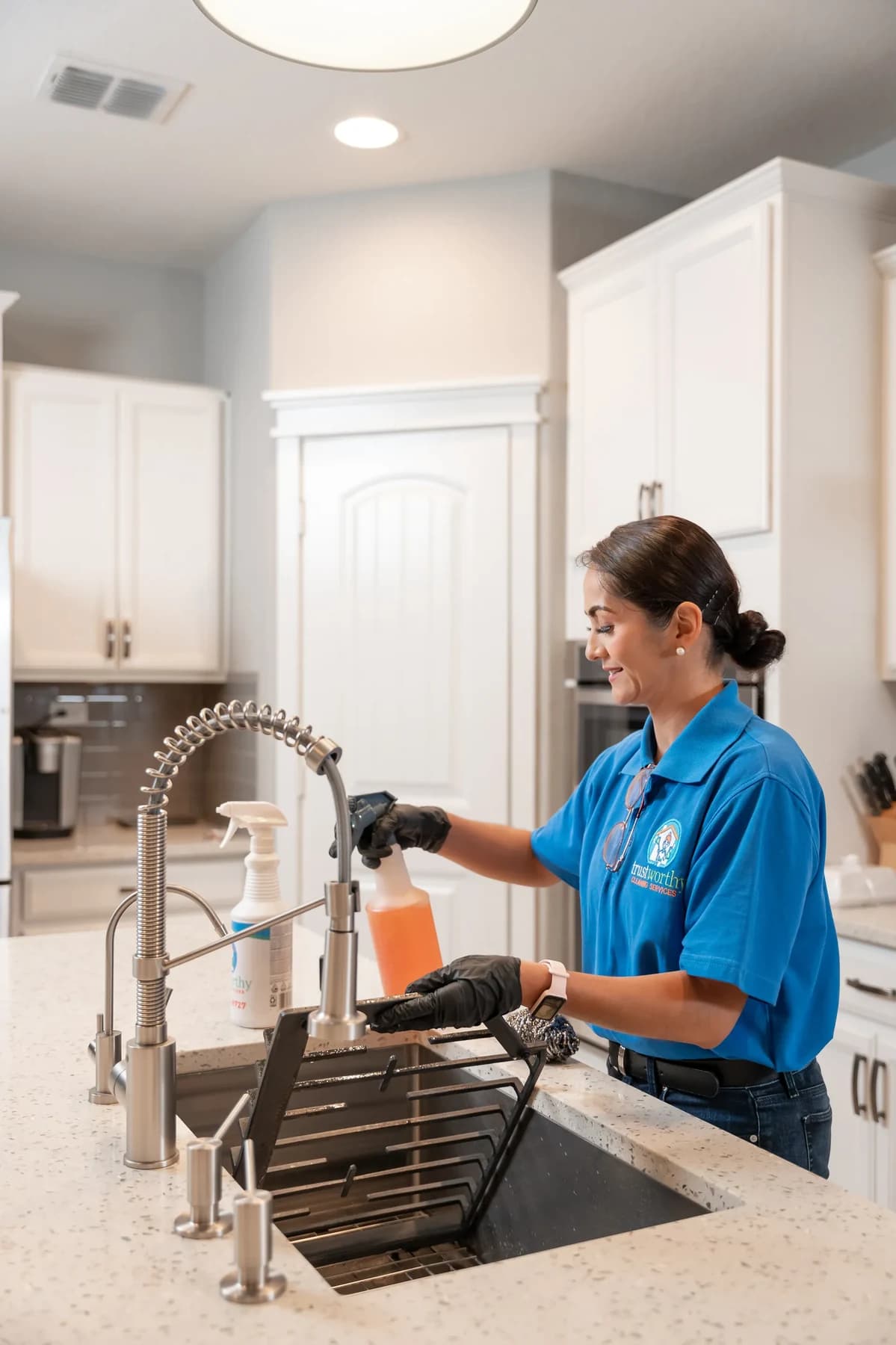 Cleaner washing stove grates in the kitchen sink