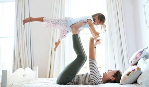 mom and daughter playing