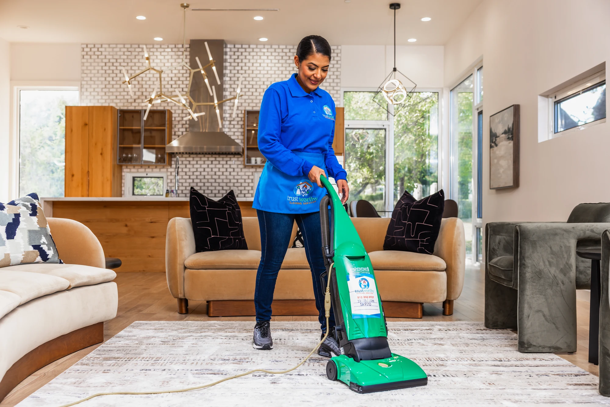 Vacuuming carpet in an Austin, TX apartment