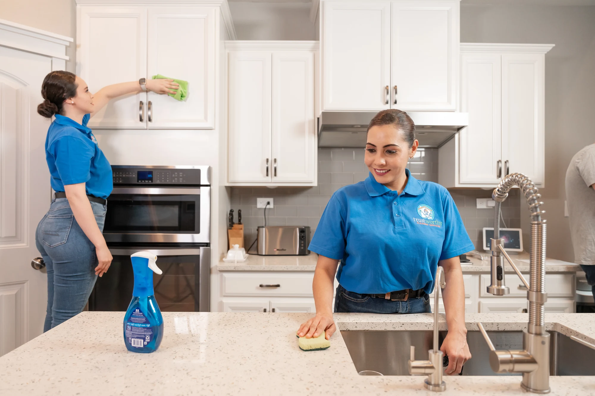 Trustworthy team deep cleaning a kitchen in Austin, TX